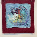 Sea Whorl, 2021,10"x9",Indigo dyed cotton,felt,button,embroidery floss